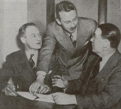 three Lions founders sit at a table